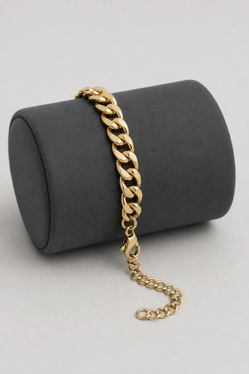 7mm Gold-tone Cuban Link Bracelet — stand — Gold-tone