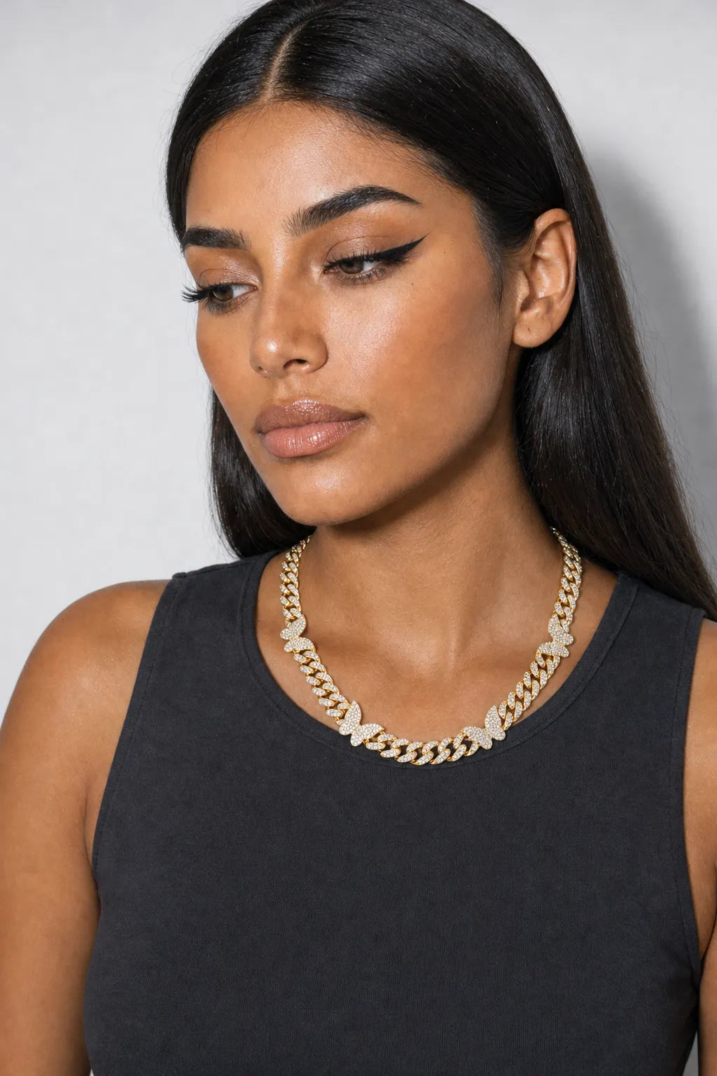 Butterfly Cuban Link Chain — worn — Gold-tone