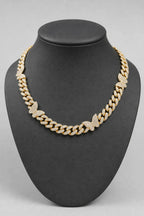 Butterfly Cuban Link Chain — stand — Gold-tone