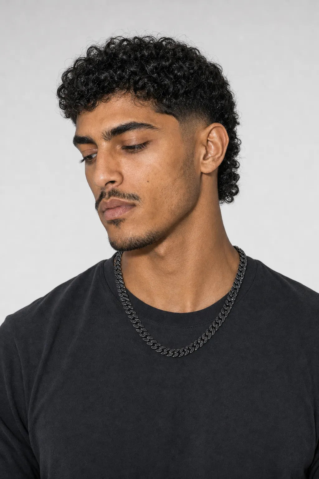 Black Iced Out Cuban Chain — worn — black-tone