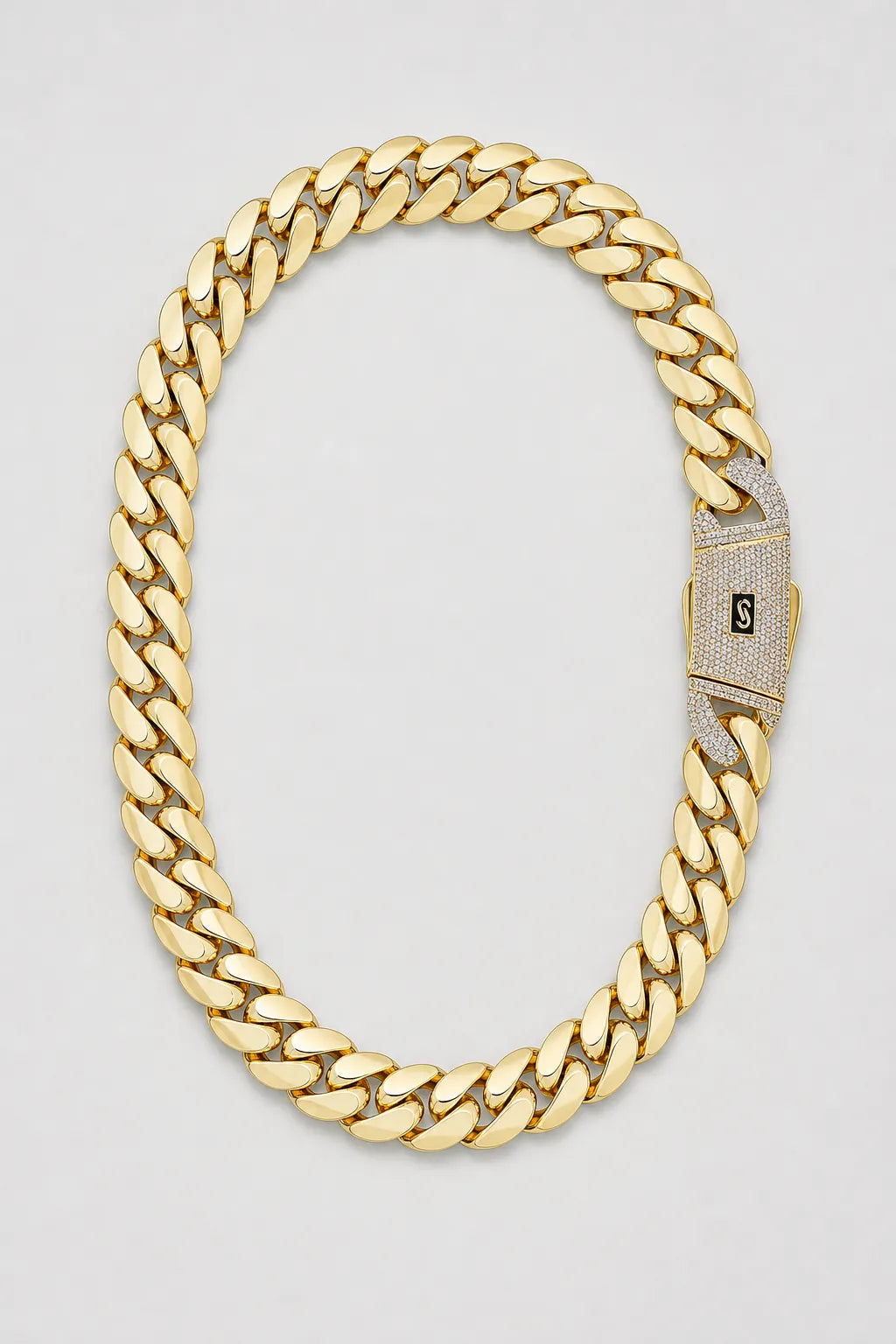 20mm gold-tone Cuban link chain — presentation — gold-tone