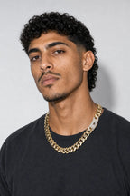 20mm gold-tone Cuban link chain — worn — gold-tone