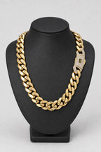 20mm gold-tone Cuban link chain — stand — gold-tone
