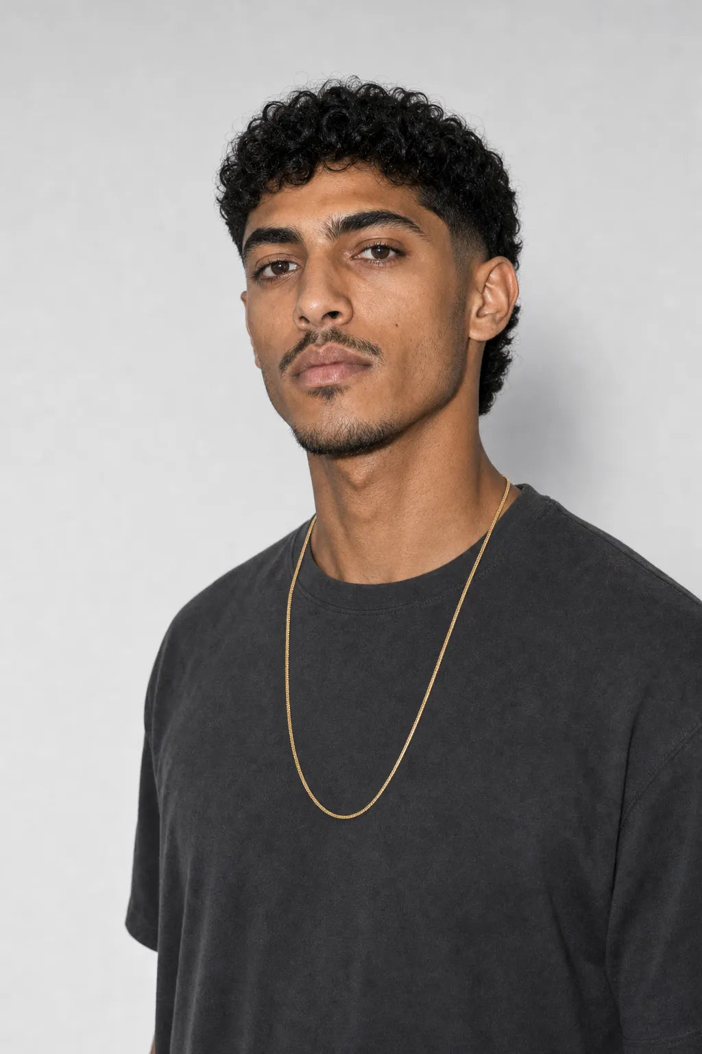 1mm Gold‑Tone Snake Chain — worn — gold‑tone