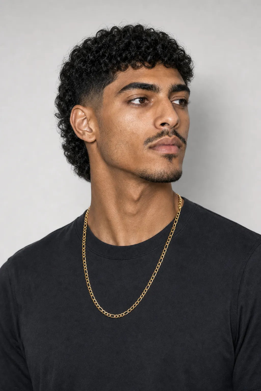 4.5mm Gold-Tone Figaro Chain — worn — gold-tone