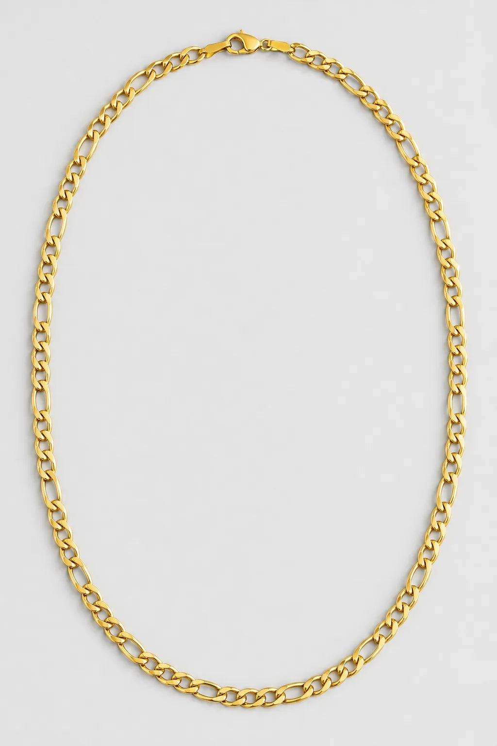 6mm Gold-Tone Figaro Chain — presentation — gold-tone