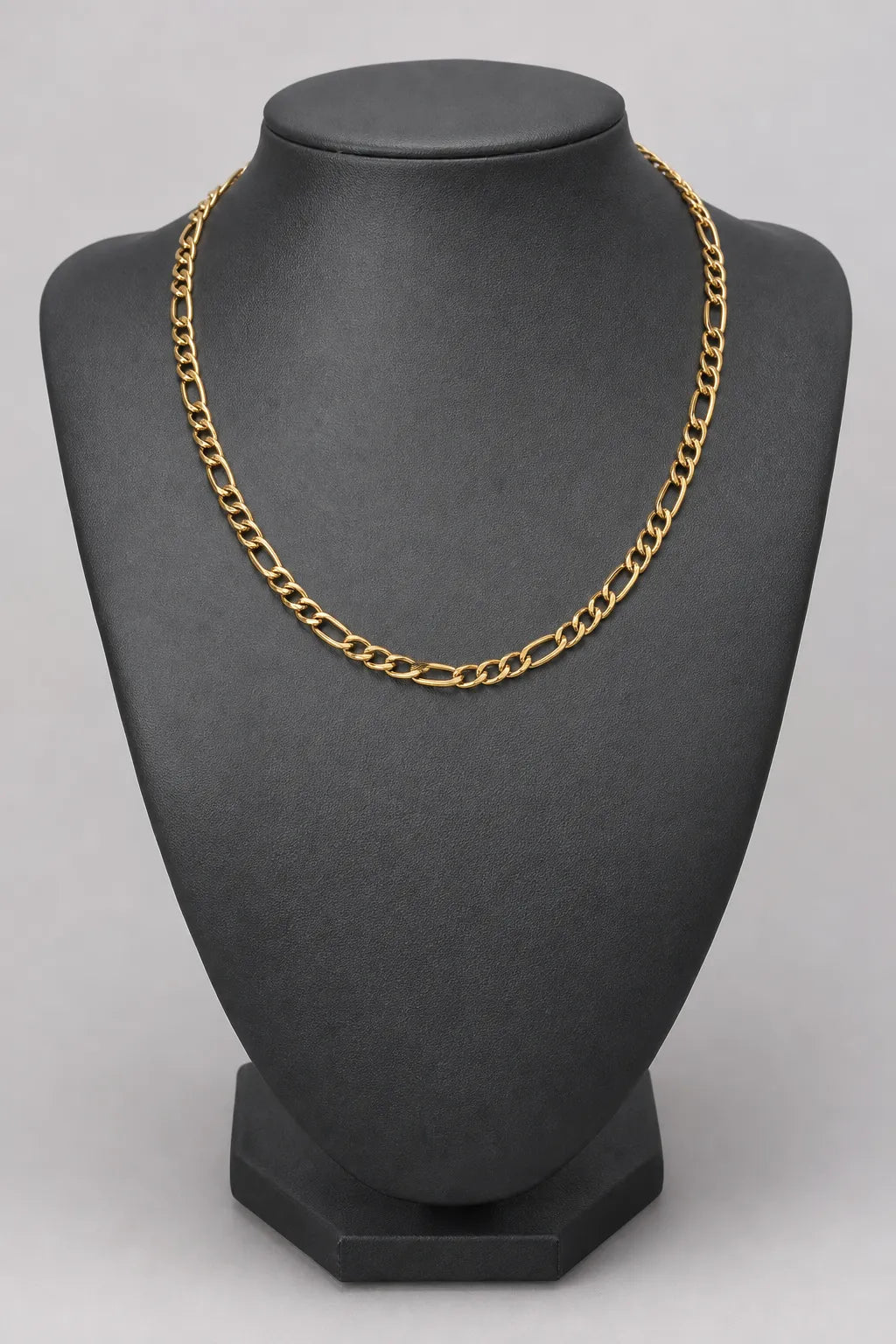 6mm Gold-Tone Figaro Chain — stand — gold-tone