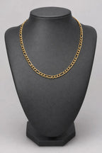 6mm Gold-Tone Figaro Chain — stand — gold-tone