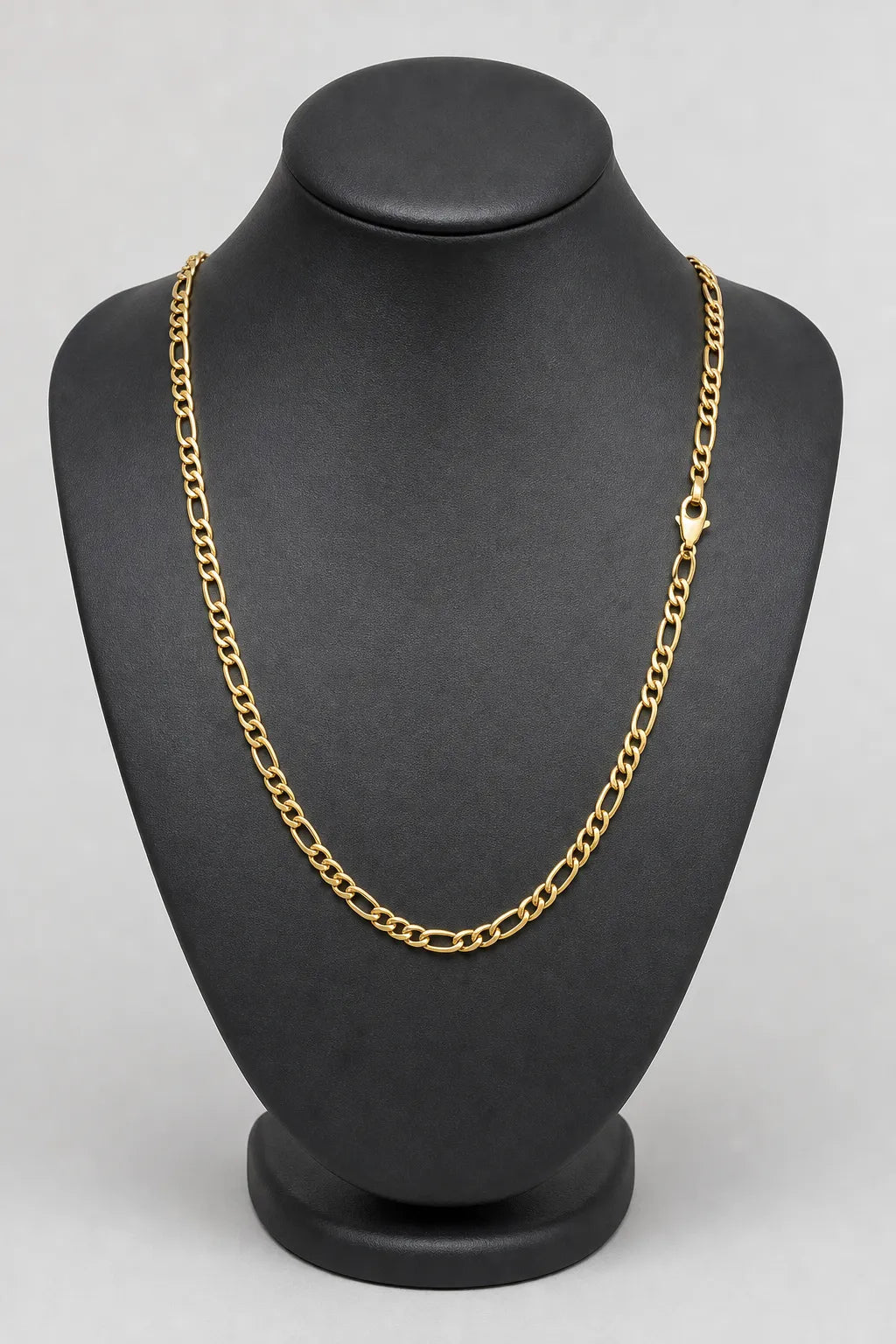3mm Gold-tone Figaro Chain — stand — Gold-tone