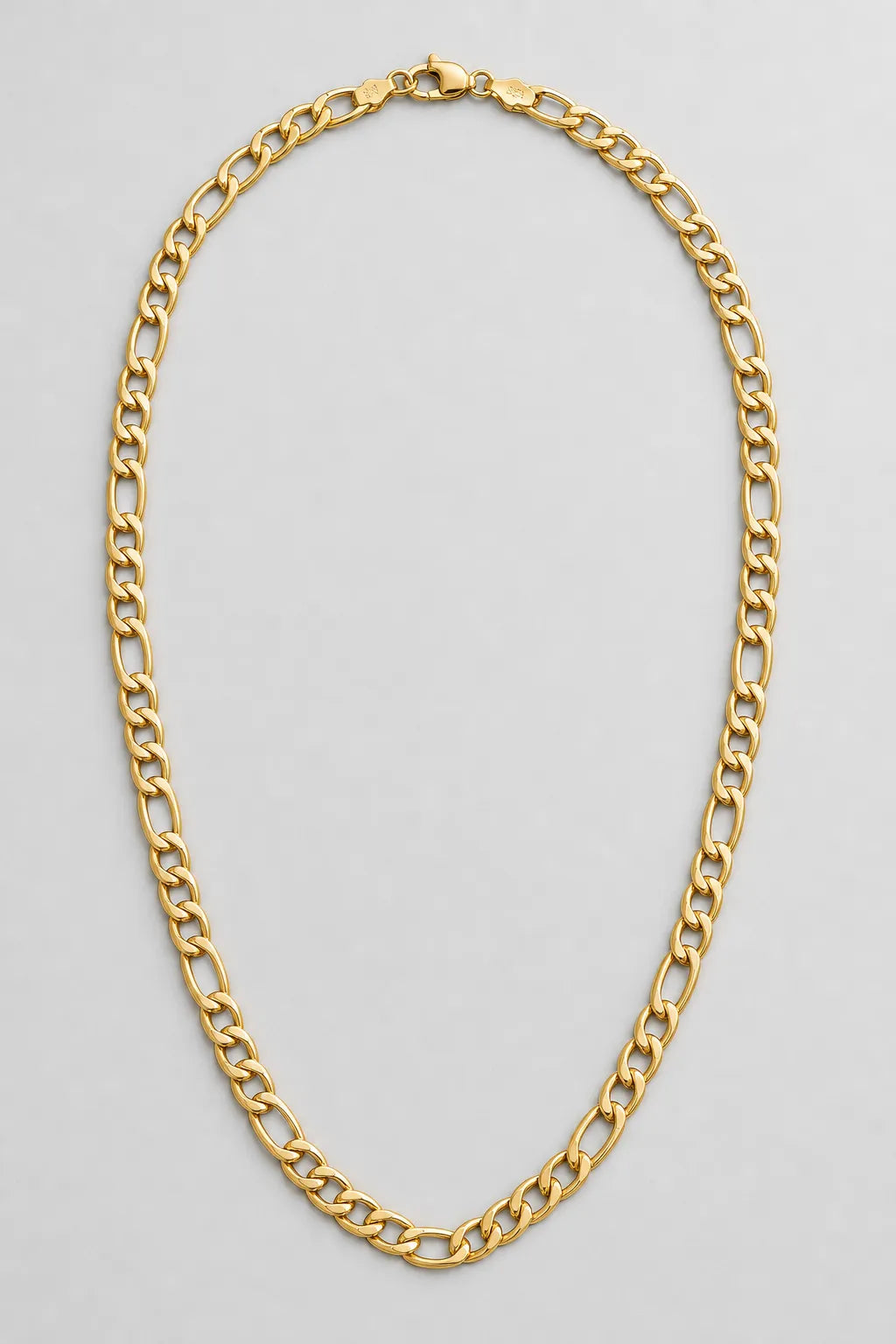 7.5mm Gold-Tone Figaro Chain — presentation — Gold-tone
