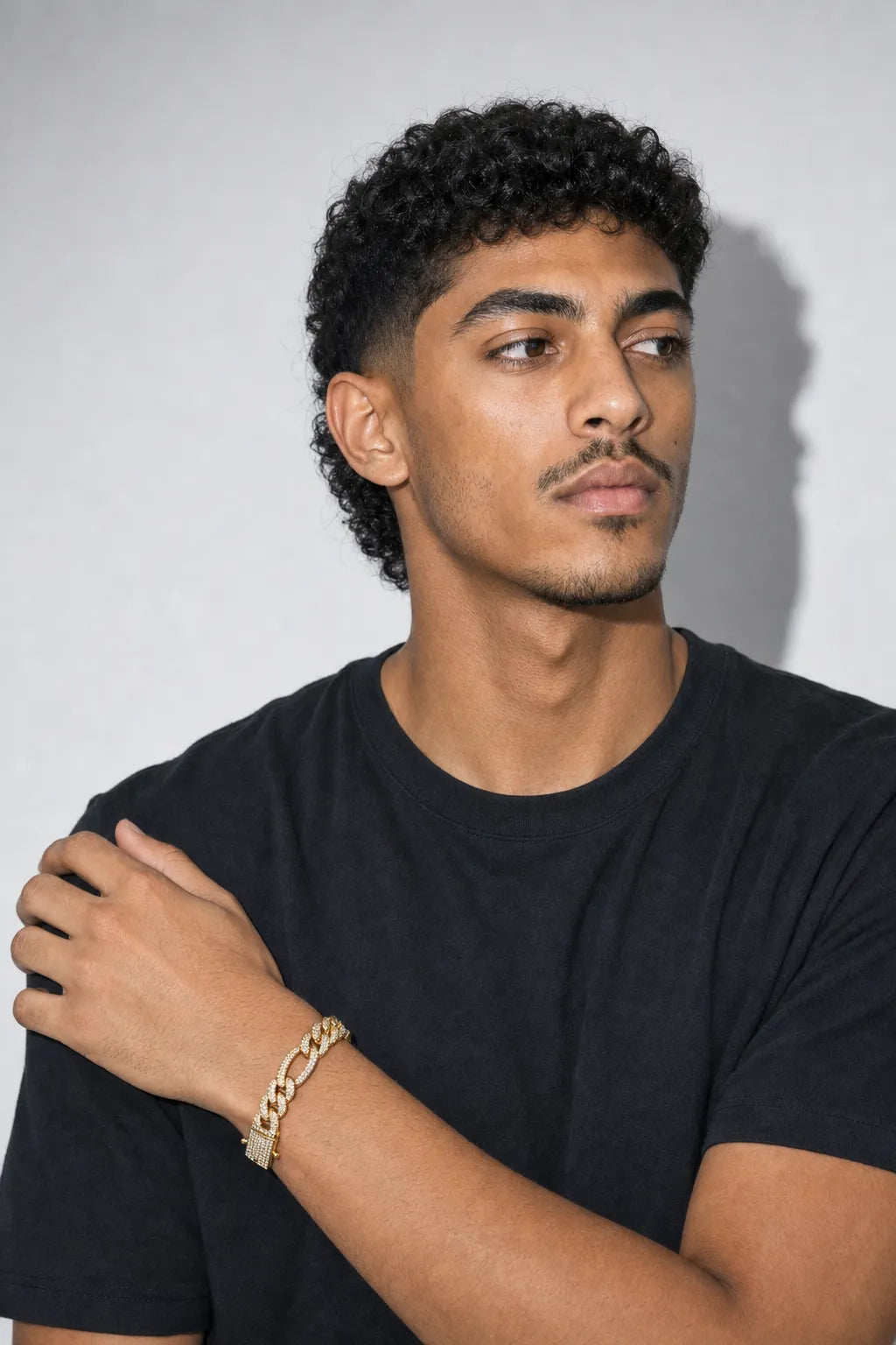 Iced Figaro Bracelet — worn — Gold‑tone