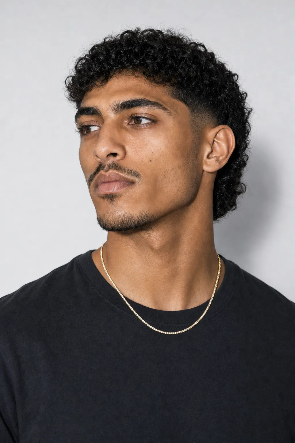 tennis chain choker — worn — Gold-tone