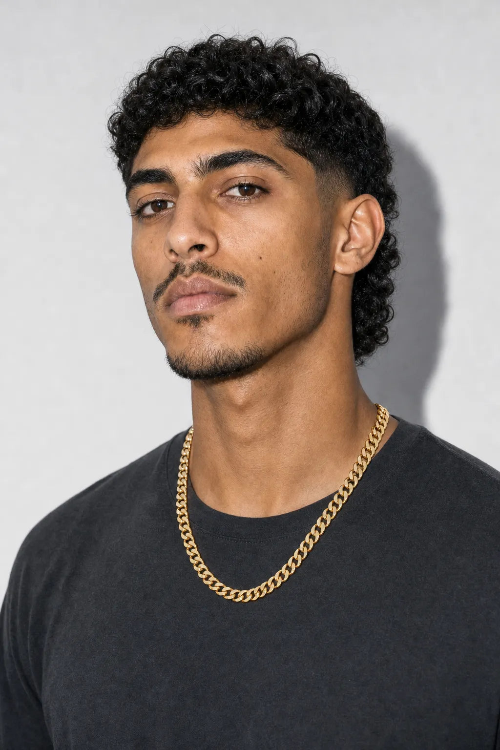 15mm Gold-tone Cuban Link Chain — worn — Gold-tone