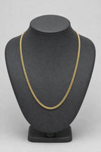 2mm gold-tone Franco chain necklace — stand — Gold-tone
