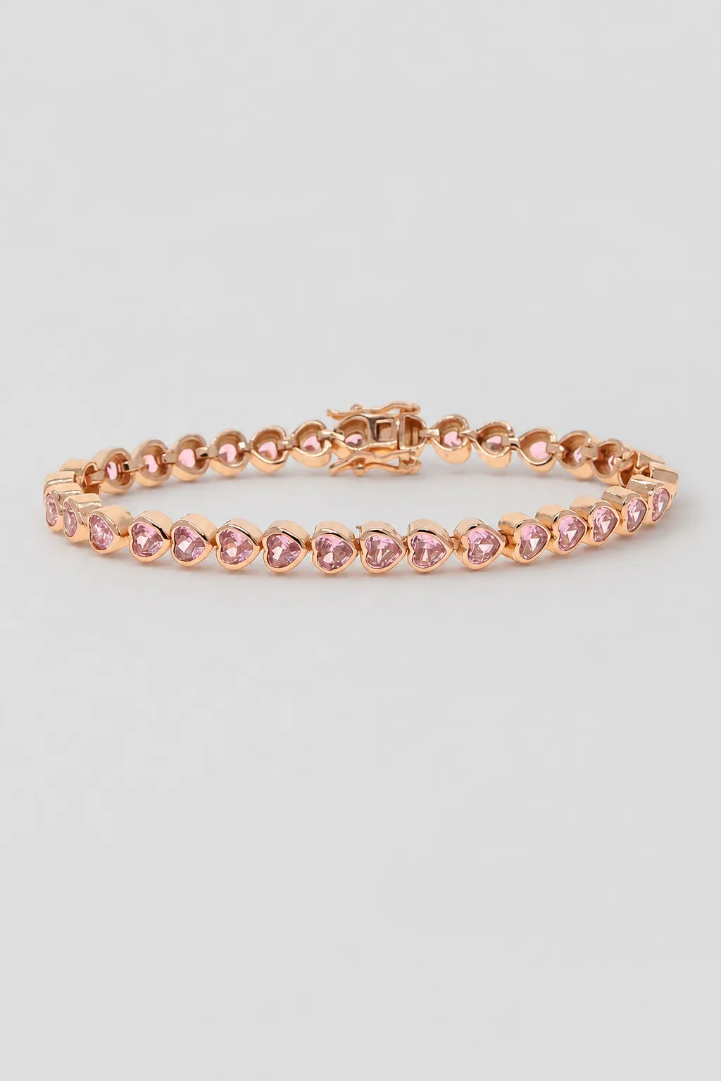 Heart Bezel Tennis Bracelet — Rose-gold-tone with clear/pink heart stones — product view