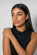 Marquise Tennis Bracelet — Main - silver-tone marquise CZ line — worn on an adult wrist