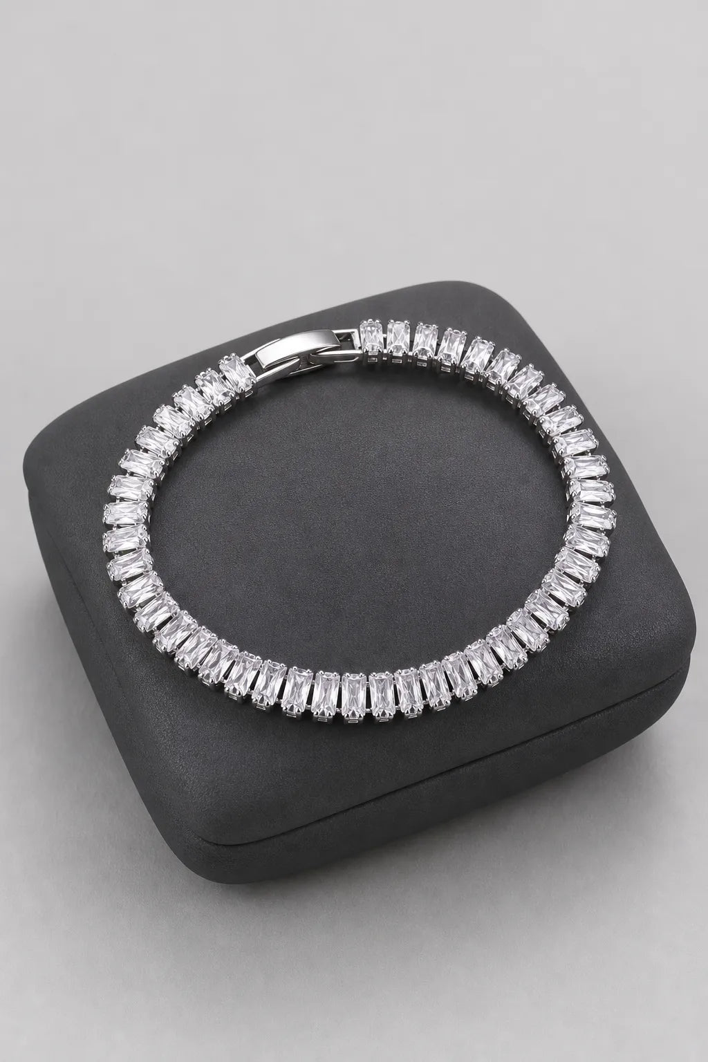 Baguette Tennis Bracelet — White A — on a display cushion