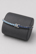 Two Tone Tennis Bracelet — Main — two tone blue tennis bracelet — on a display cushion