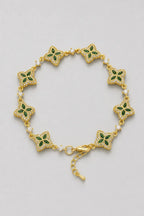 Flower Tennis Bracelet — Gold-tone with green centres (primary) — product view