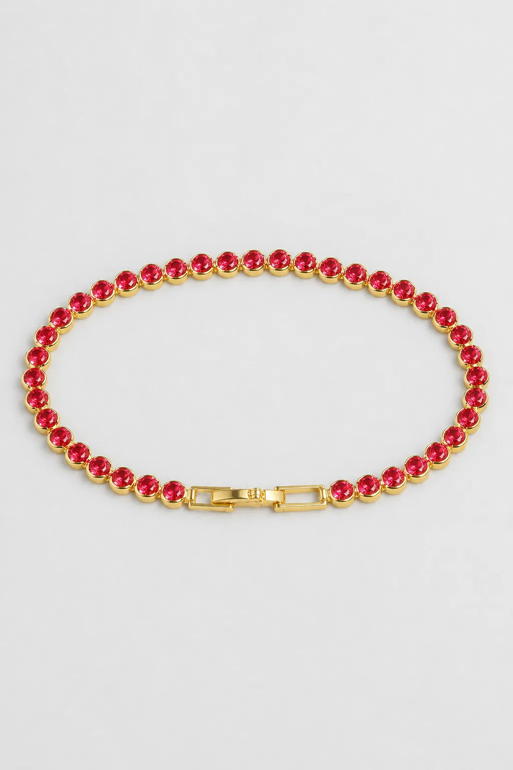 Red Tennis Bracelet — Red stones — gold-tone metal — product view