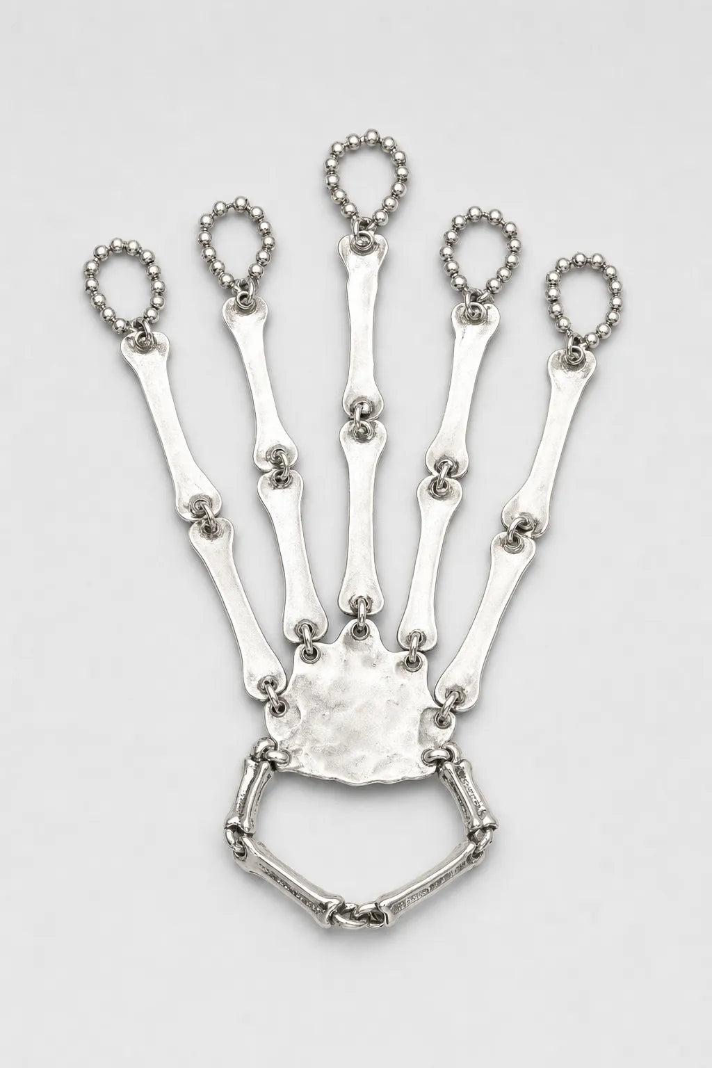Bijoux Main de squelette — sur fond gris - couleur Argent