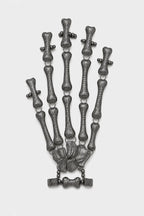 Bijoux Main de squelette — sur fond gris - couleur Noir