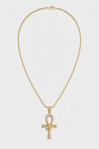 Collier croix ankh — sur fond gris — couleur Or
