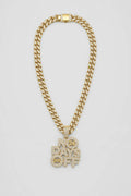 Collier drip — sur fond gris — couleur Or