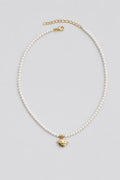 Collier perle planete — sur fond gris
