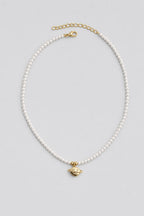Collier perle planete — sur fond gris
