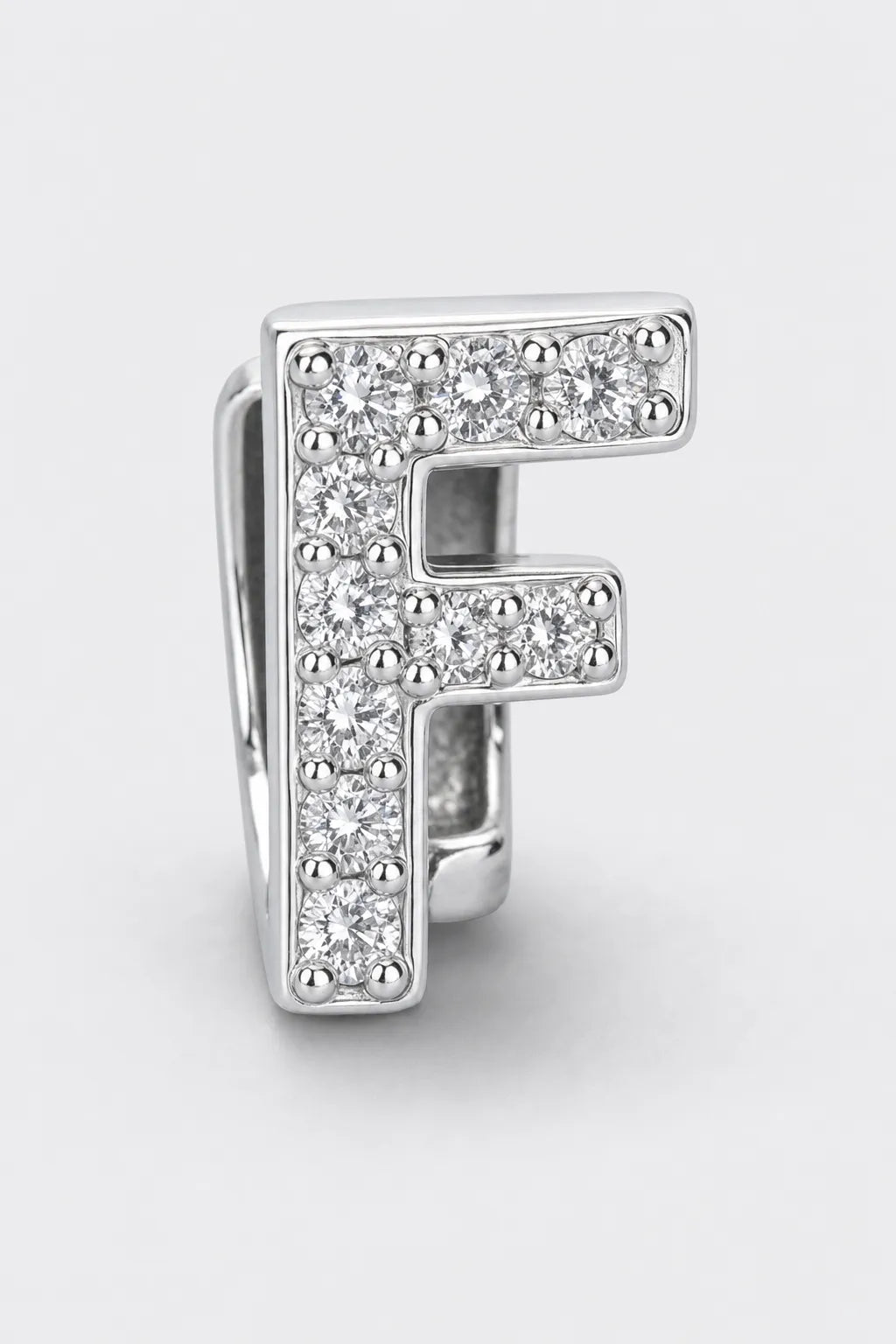 Grillz letters — sur fond gris - Argent - lettre F