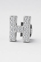 Grillz letters — sur fond gris - Argent - lettre H