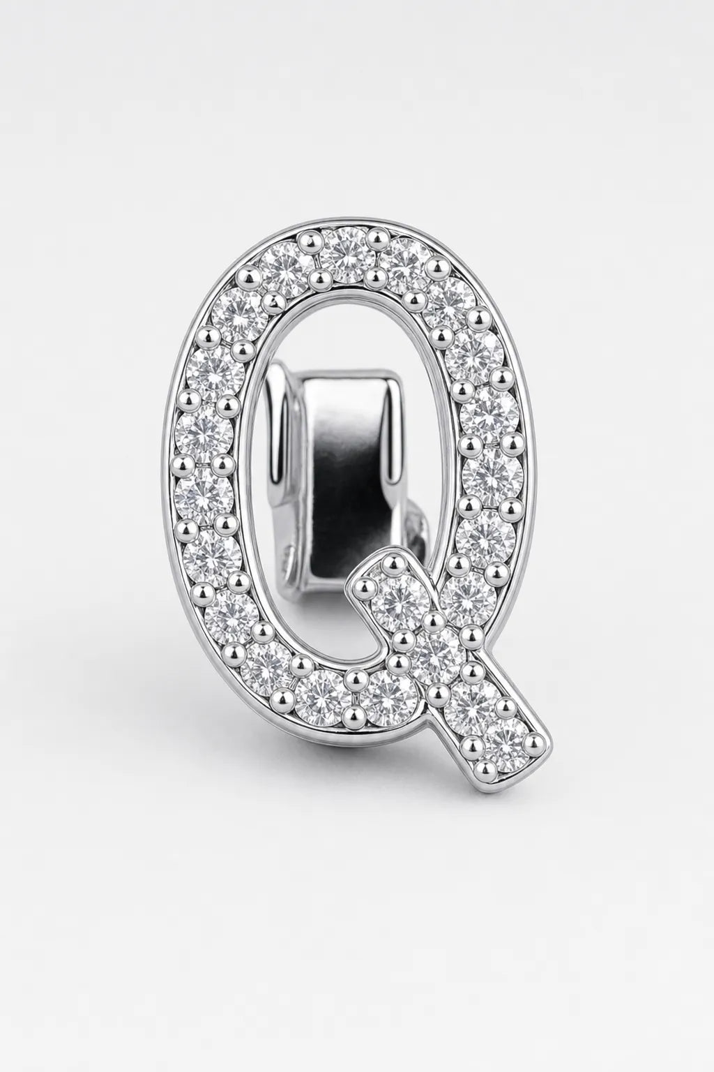Grillz letters — sur fond gris - Argent - lettre Q
