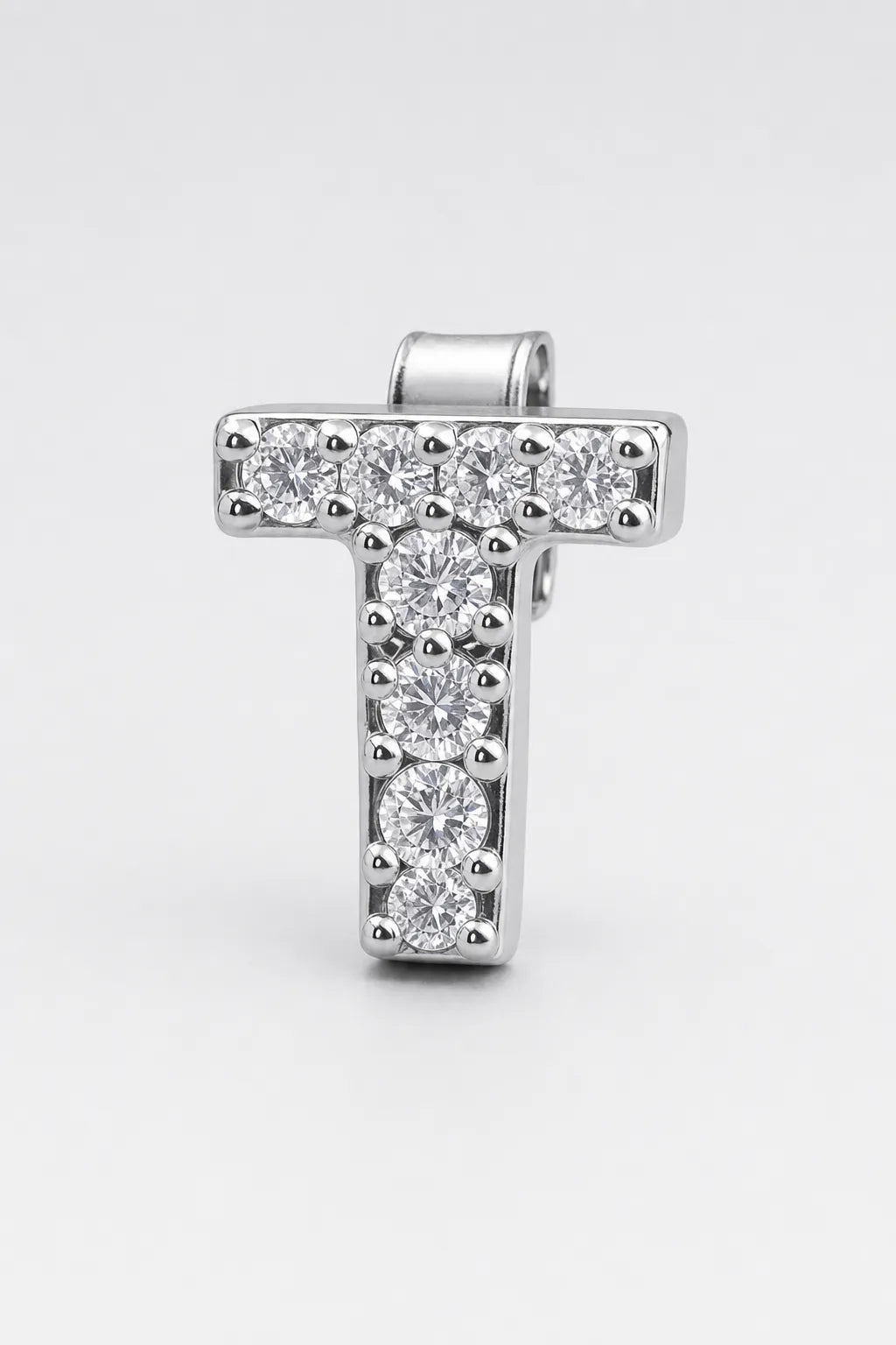 Grillz letters — sur fond gris - Argent - lettre T