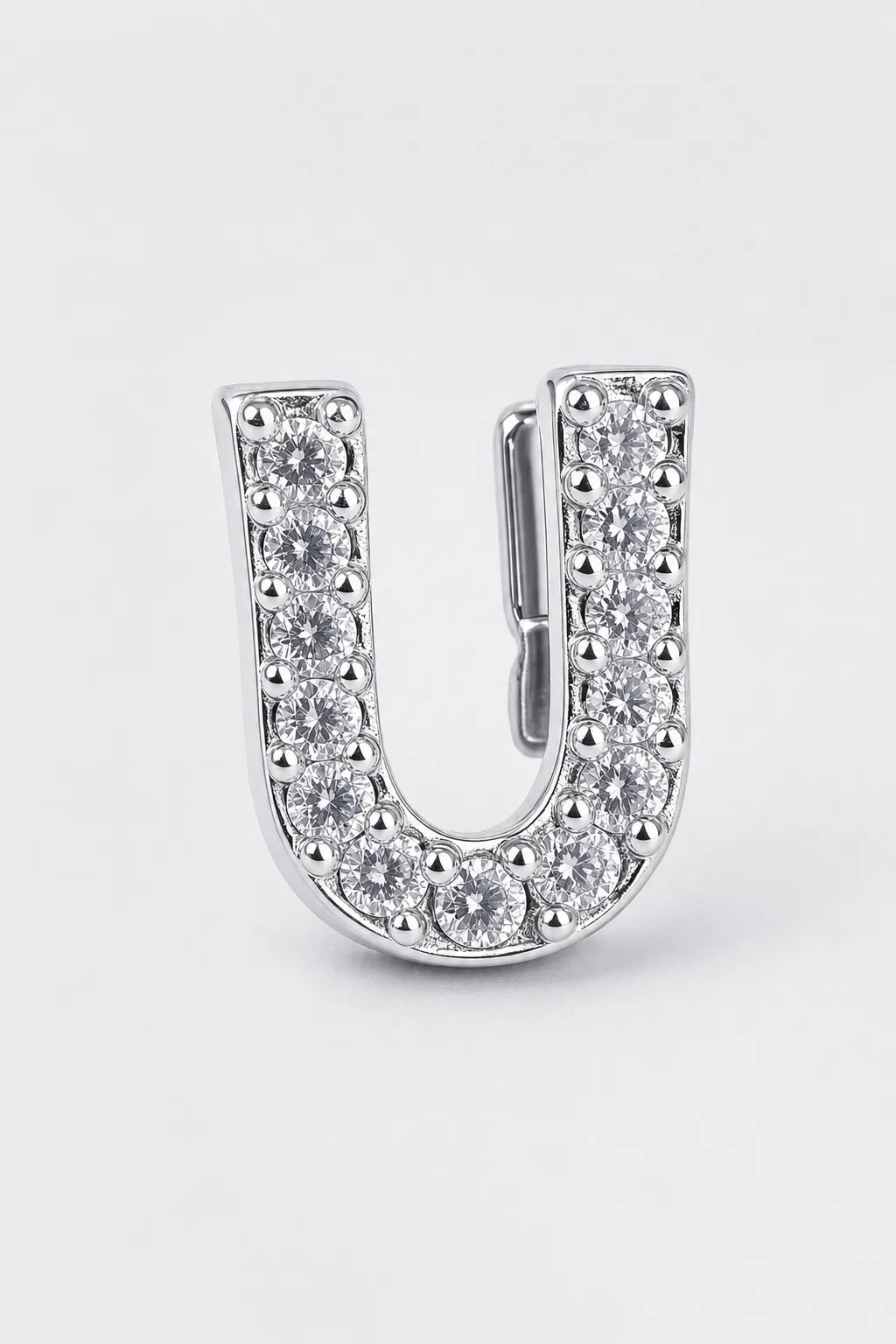 Grillz letters — sur fond gris - Argent - lettre U