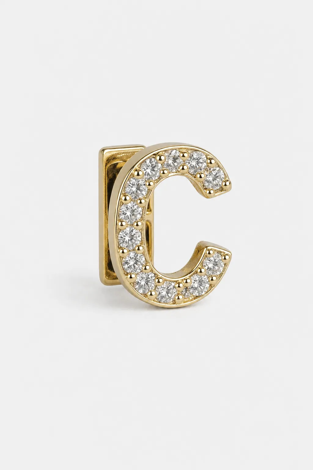 Grillz letters — sur fond gris - Or - lettre C