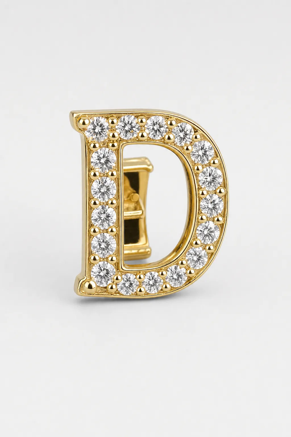 Grillz letters — sur fond gris - Or - lettre D