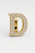 Grillz letters — sur fond gris - Or - lettre D