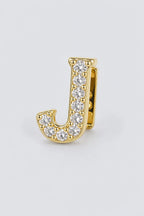 Grillz letters — sur fond gris - Or - lettre J