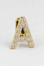 Grillz letters — sur fond gris - Or - lettre A