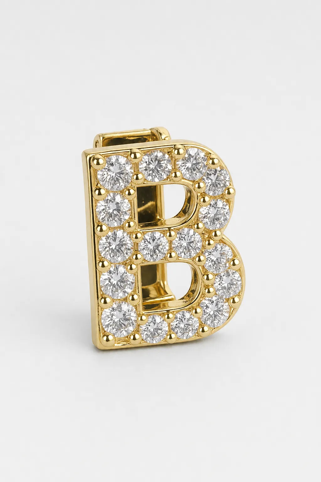 Grillz letters — sur fond gris - Or - lettre B