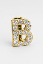 Grillz letters — sur fond gris - Or - lettre B