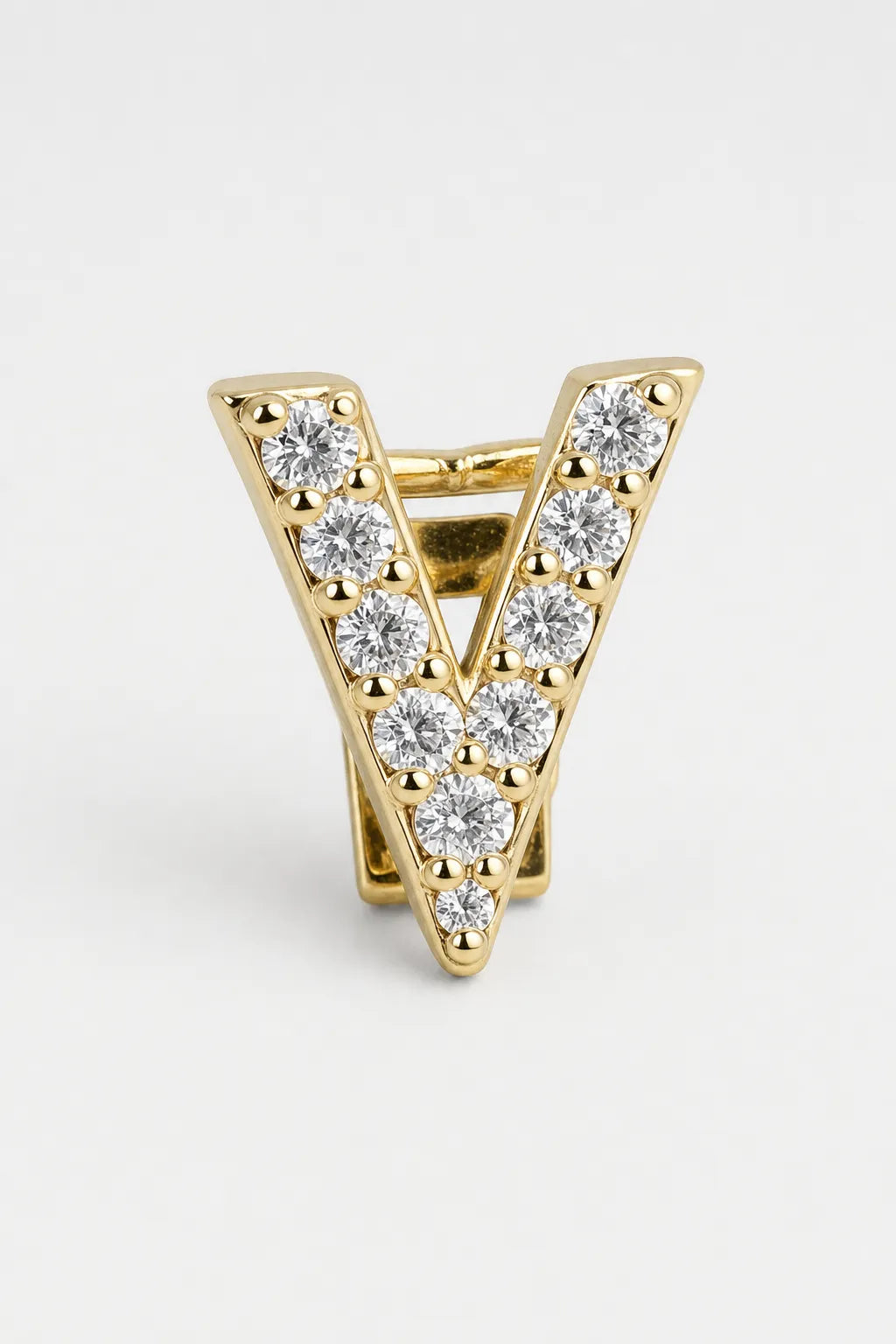 Grillz letters — sur fond gris - Or - lettre V