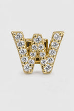 Grillz letters — sur fond gris - Or - lettre W