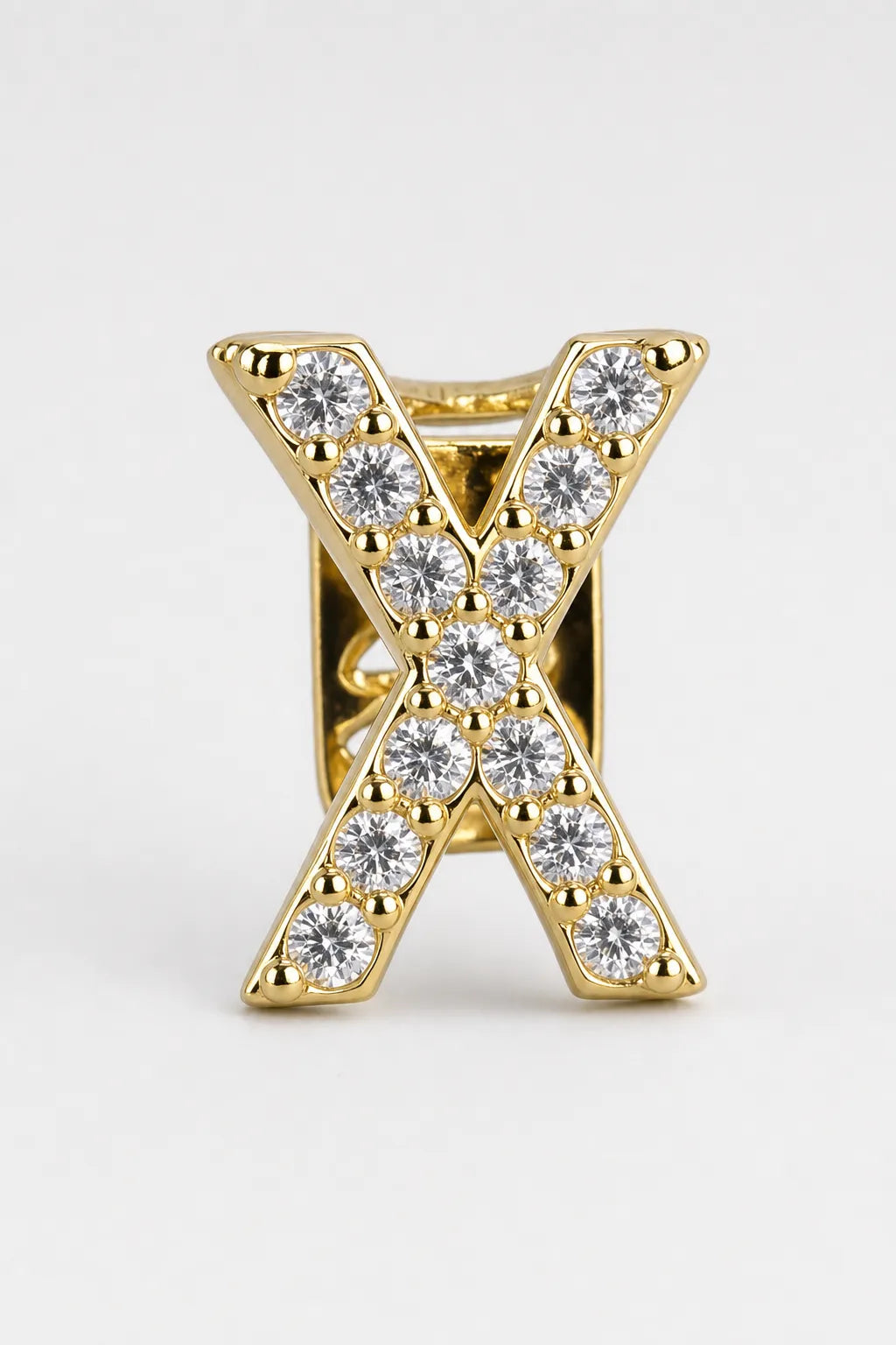 Grillz letters — sur fond gris - Or - lettre X