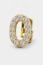 Grillz letters — sur fond gris - Or - lettre O