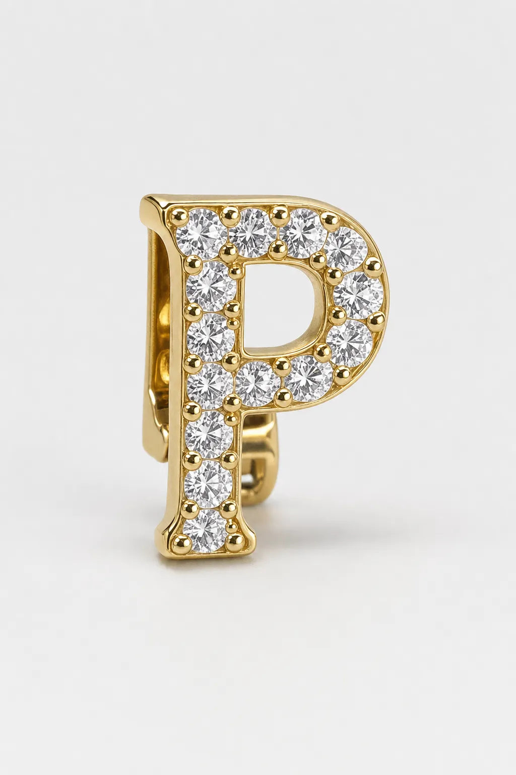 Grillz letters — sur fond gris - Or - lettre P