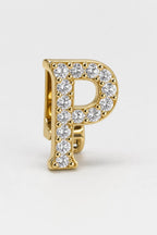 Grillz letters — sur fond gris - Or - lettre P