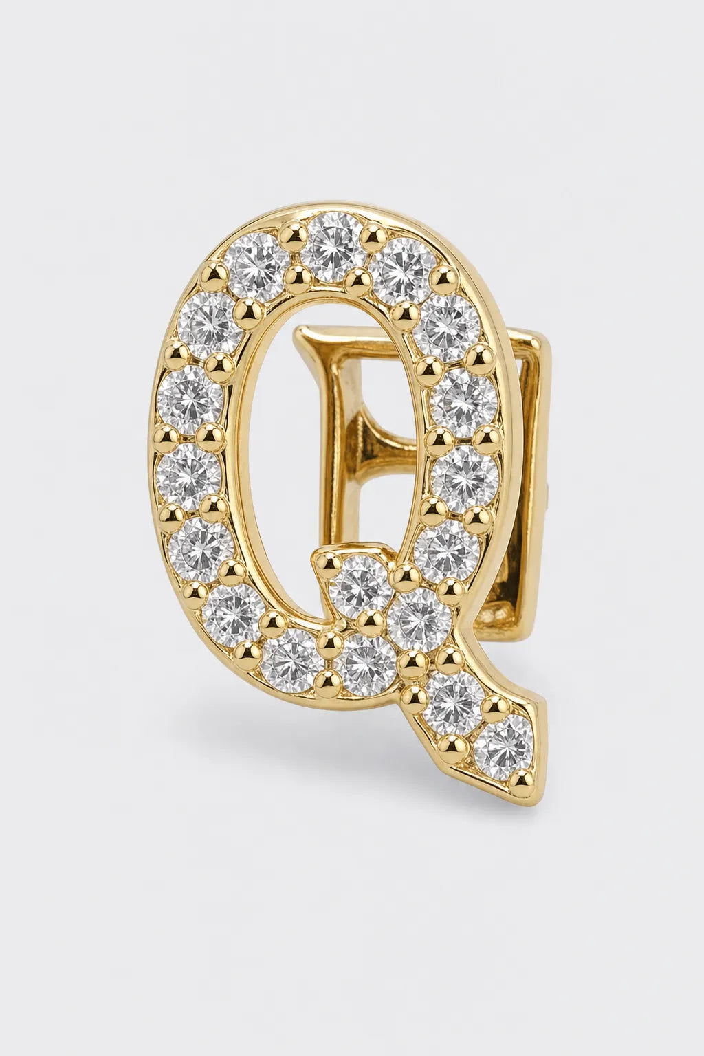 Grillz letters — sur fond gris - Or - lettre Q