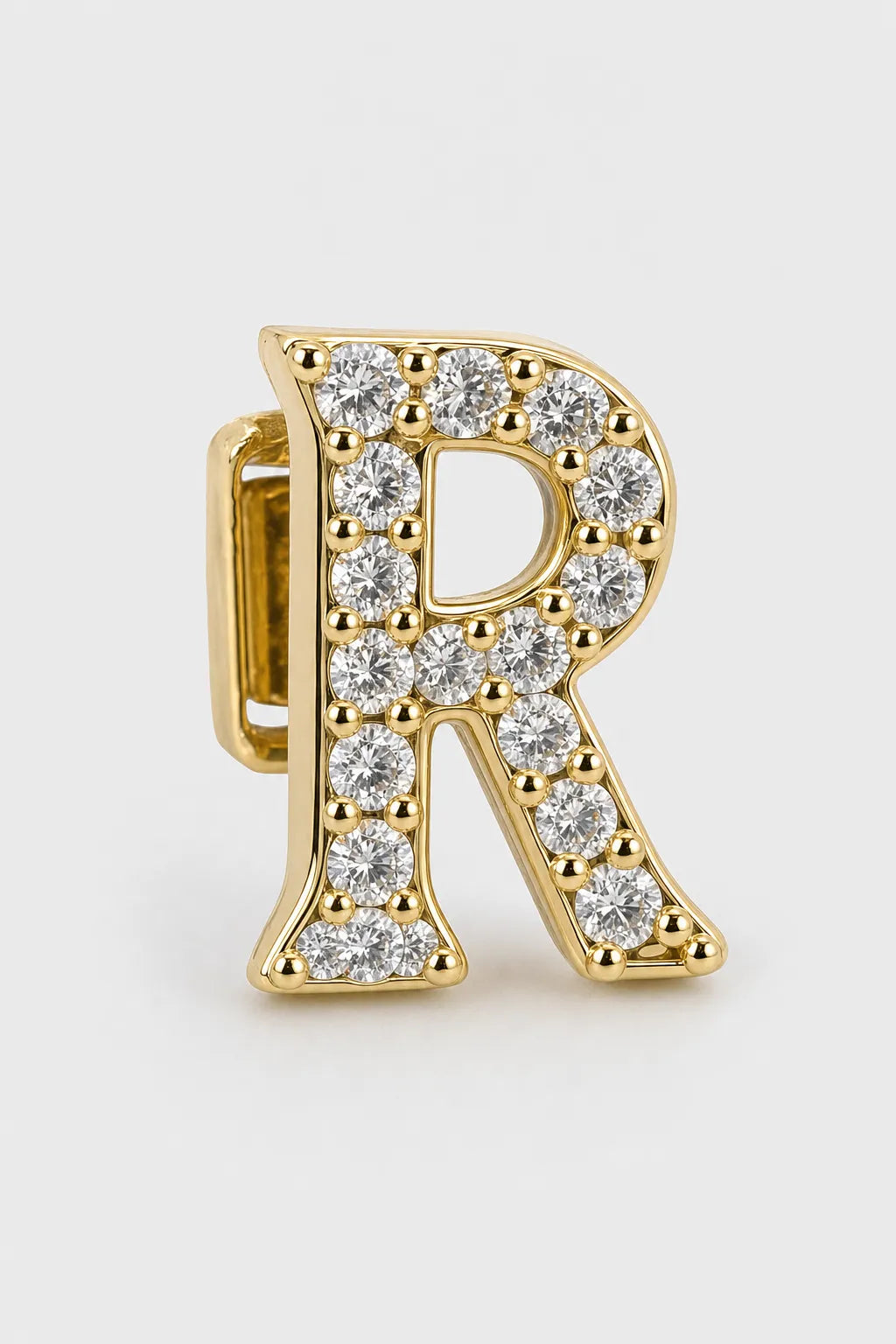 Grillz letters — sur fond gris - Or - lettre R